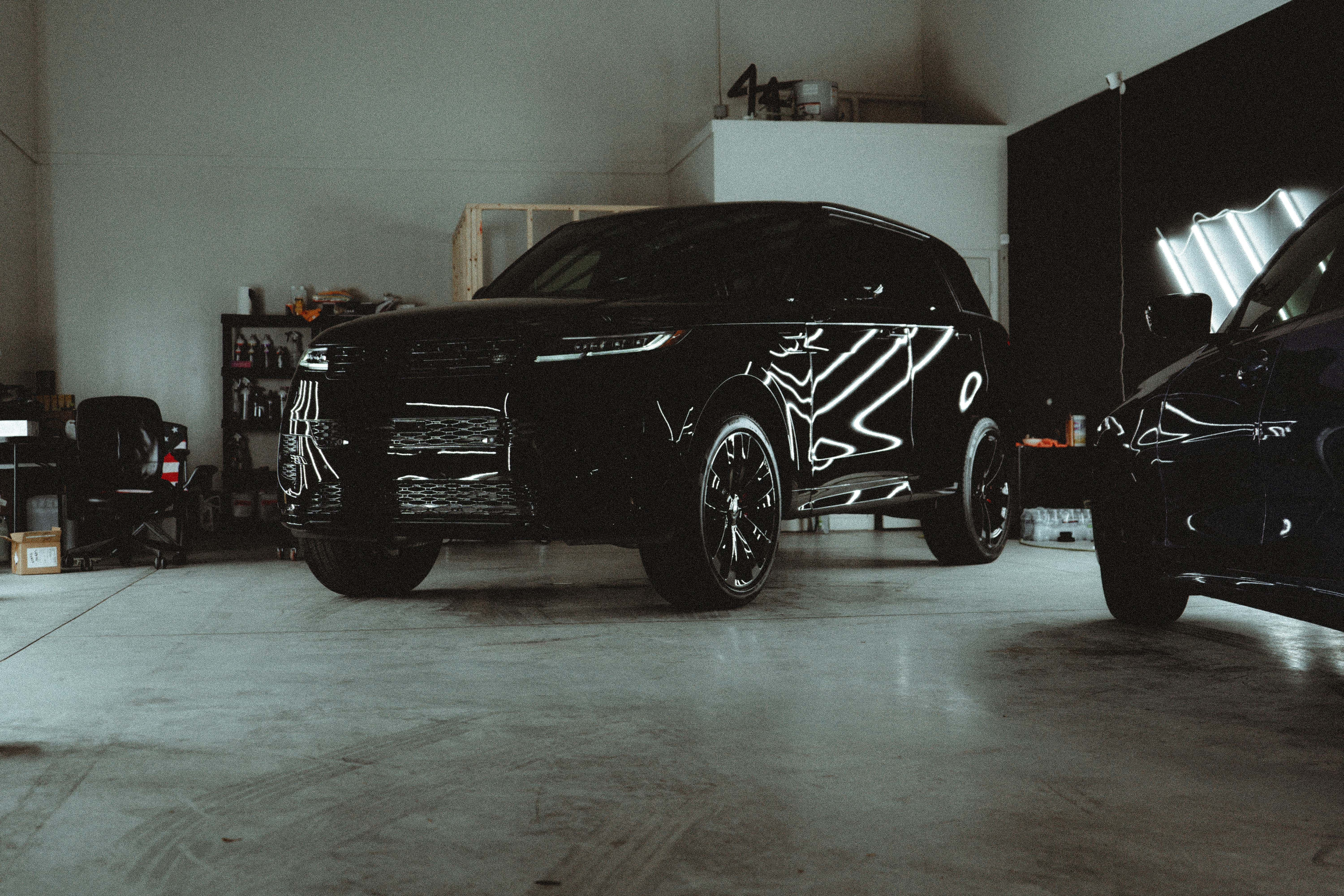 Luxury cars in garage