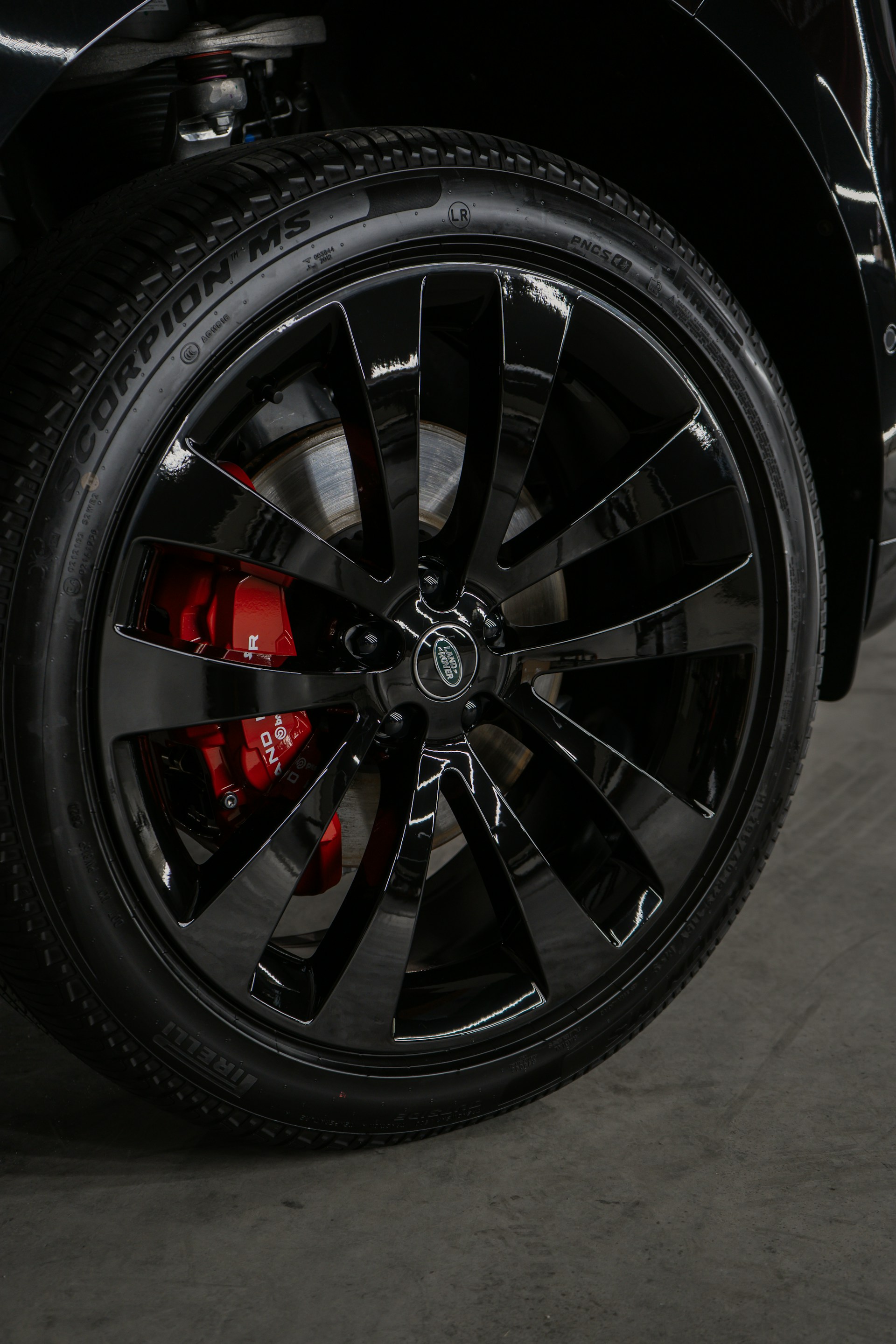 A close up of a black truck tire