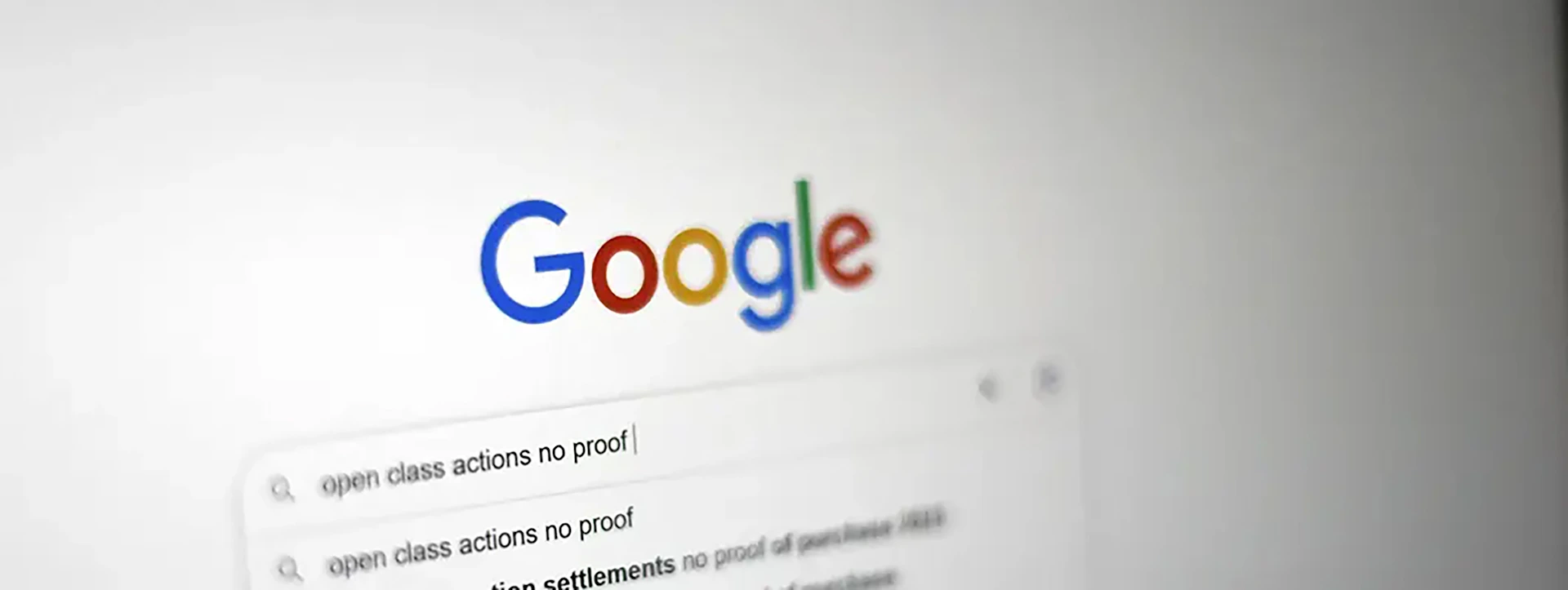 A computer screen with the google logo on it