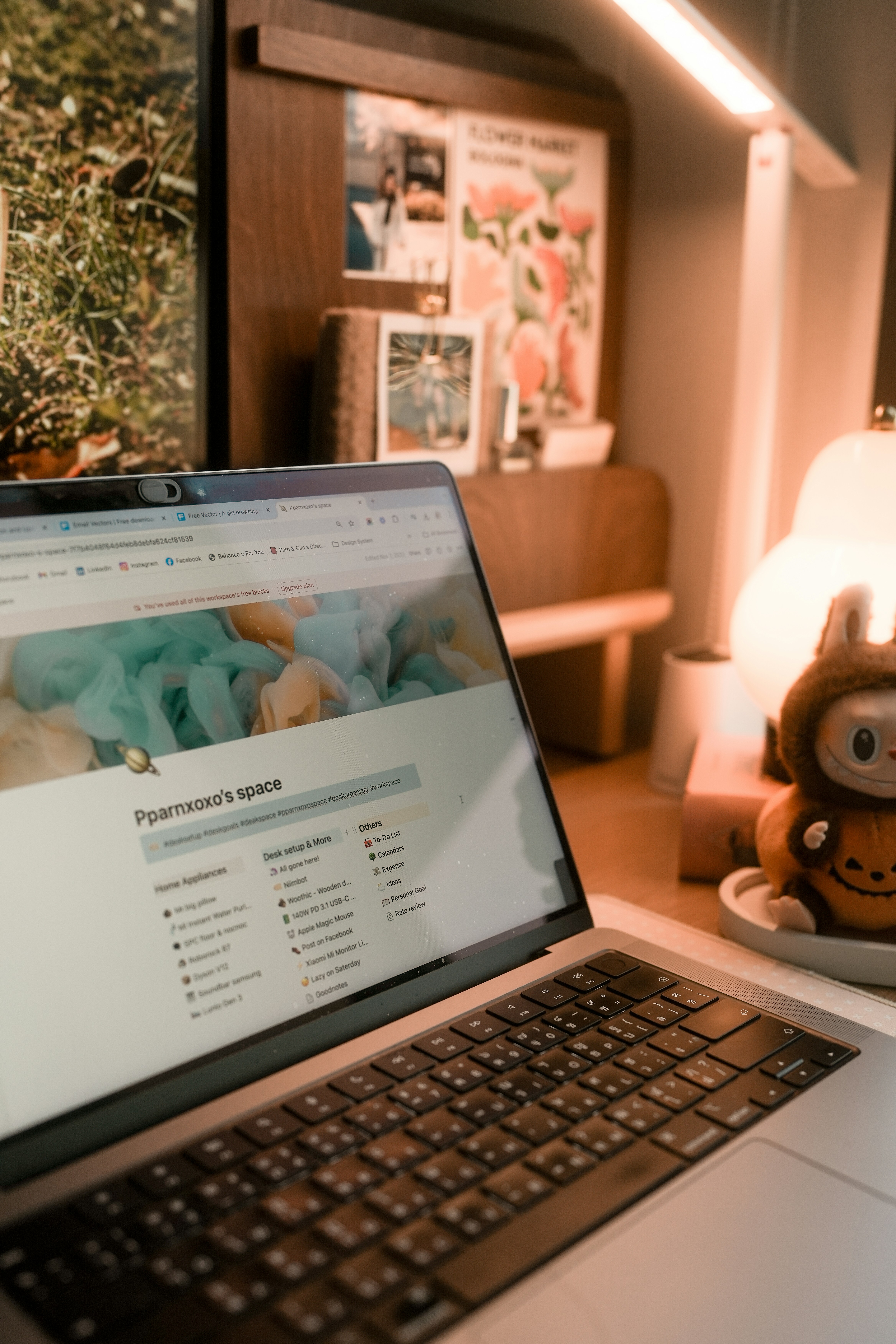 A laptop computer sitting on top of a desk
