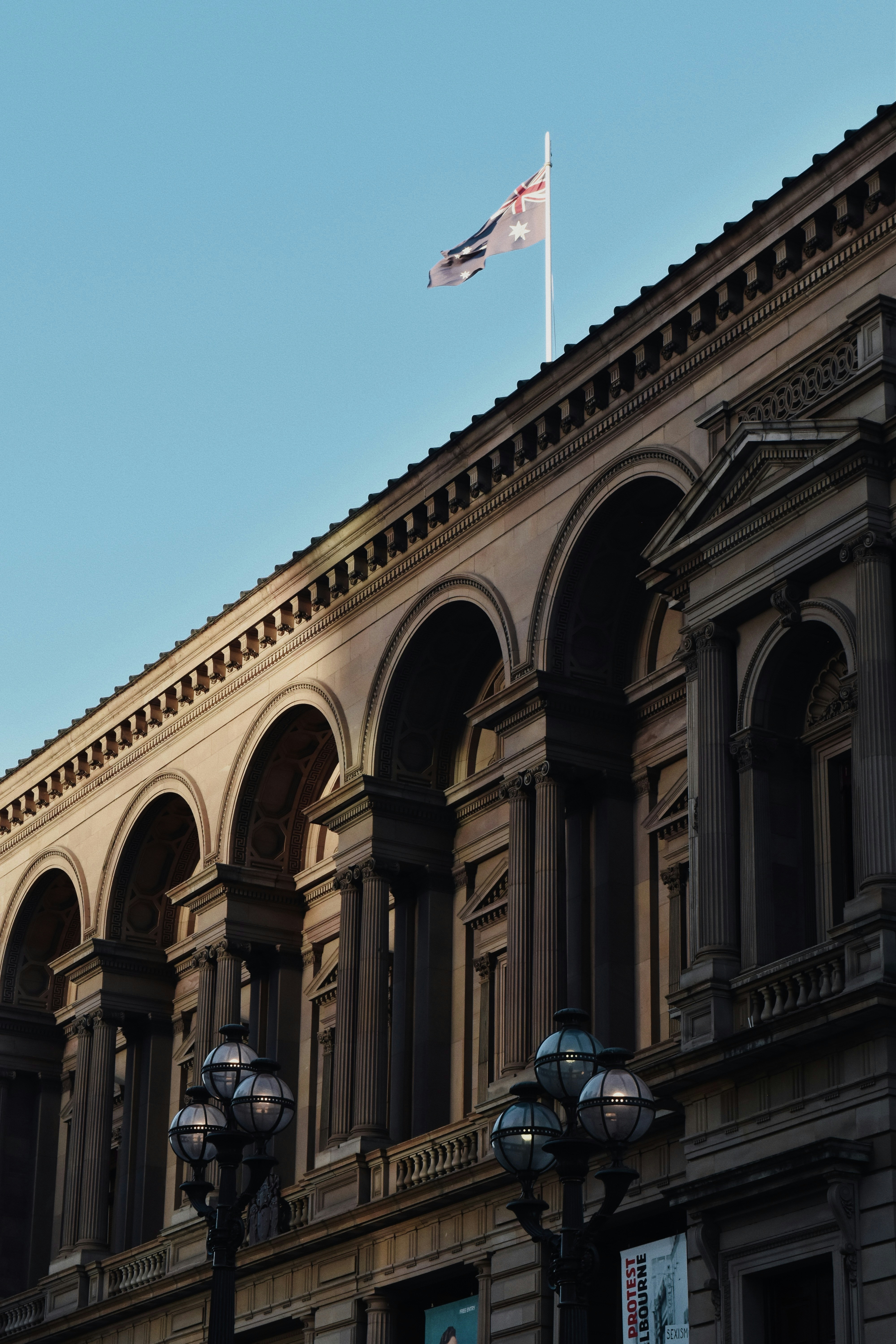 A large building with a flag on top of it