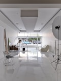 A room with a lot of chairs and lights