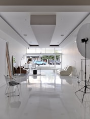 A room with a lot of chairs and lights