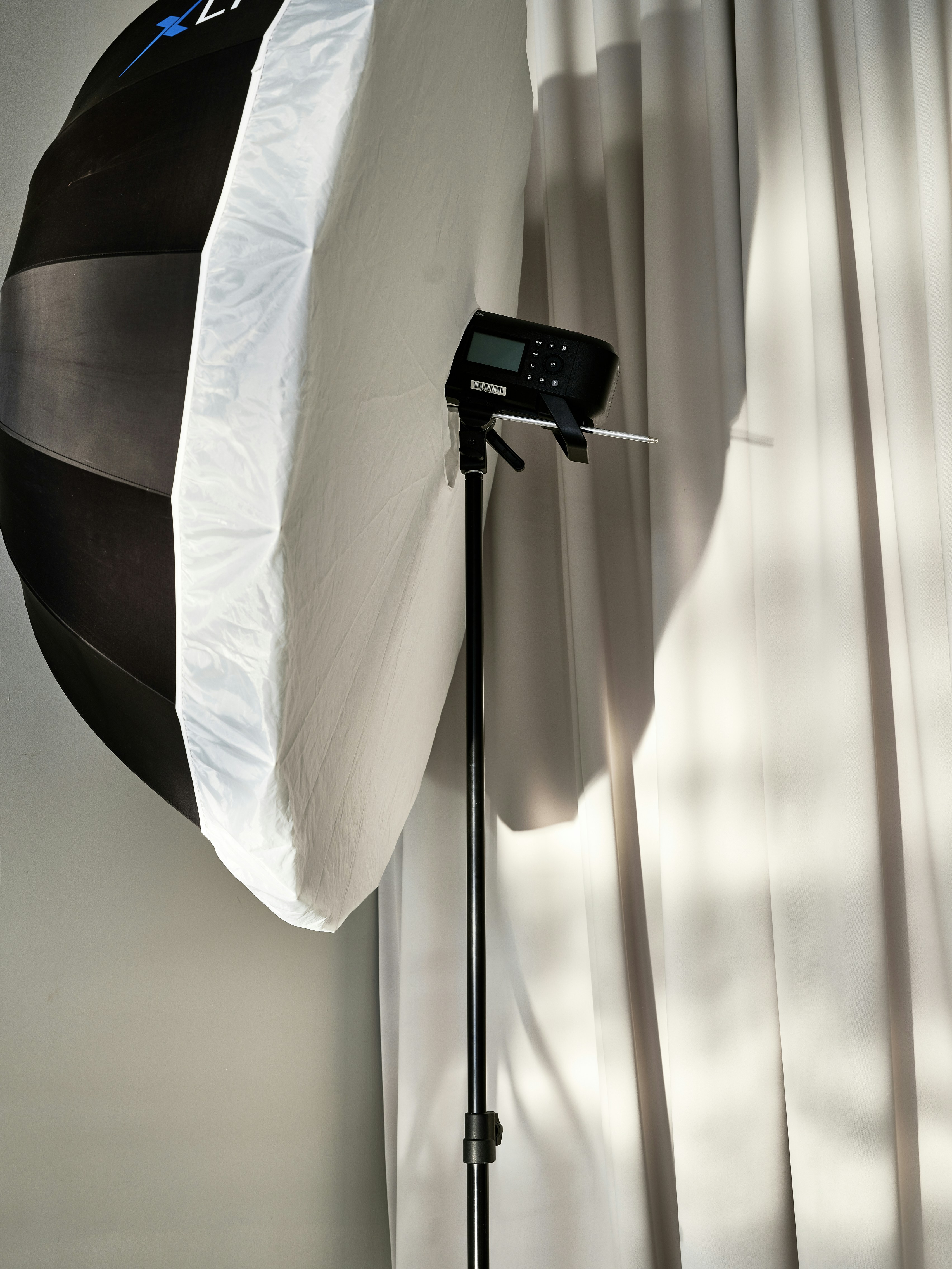 Photography softbox and light on a stand.