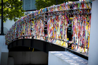 A bridge that has a bunch of ribbons on it