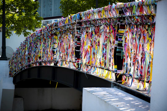 A bridge that has a bunch of ribbons on it