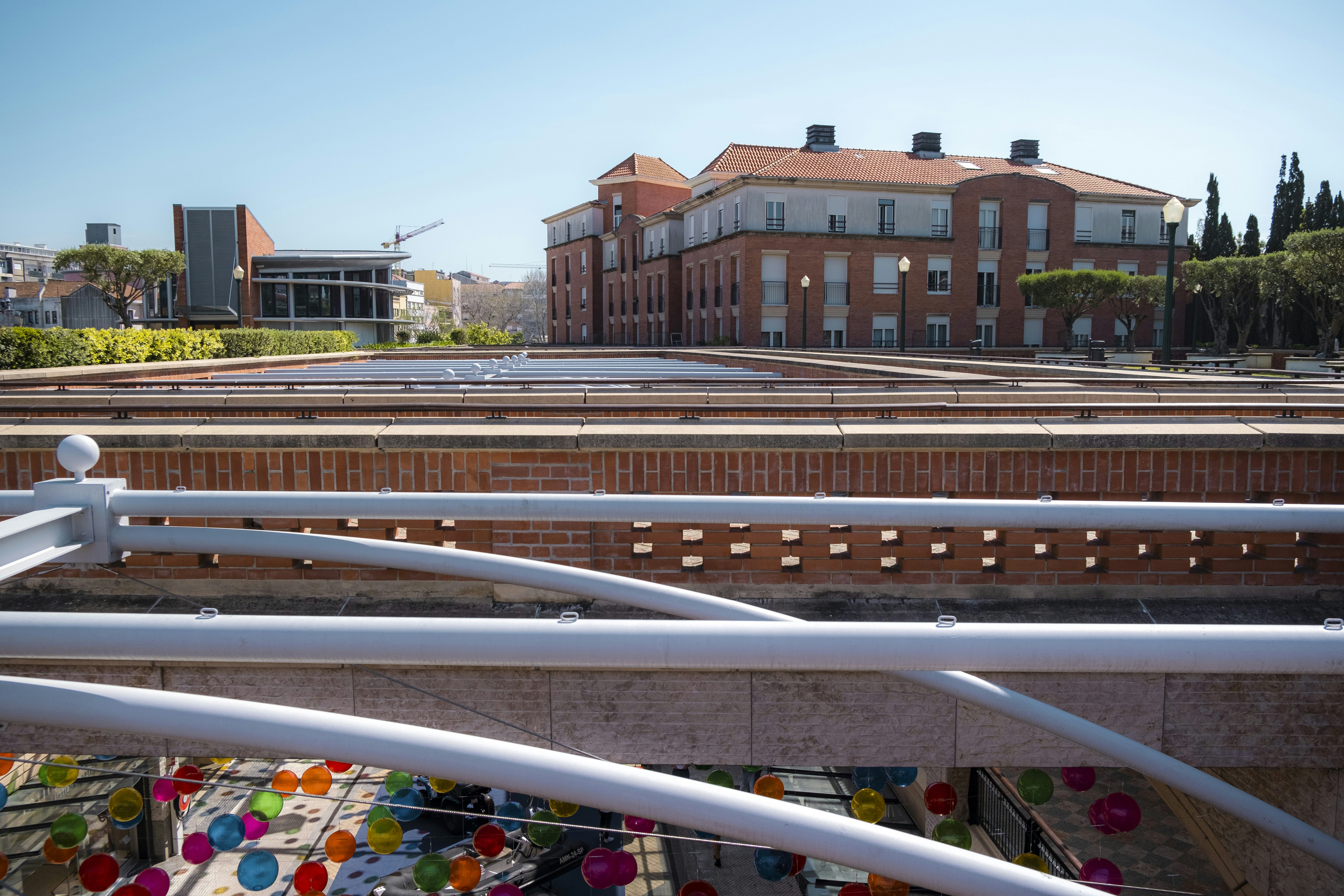 A train track with a building in the background