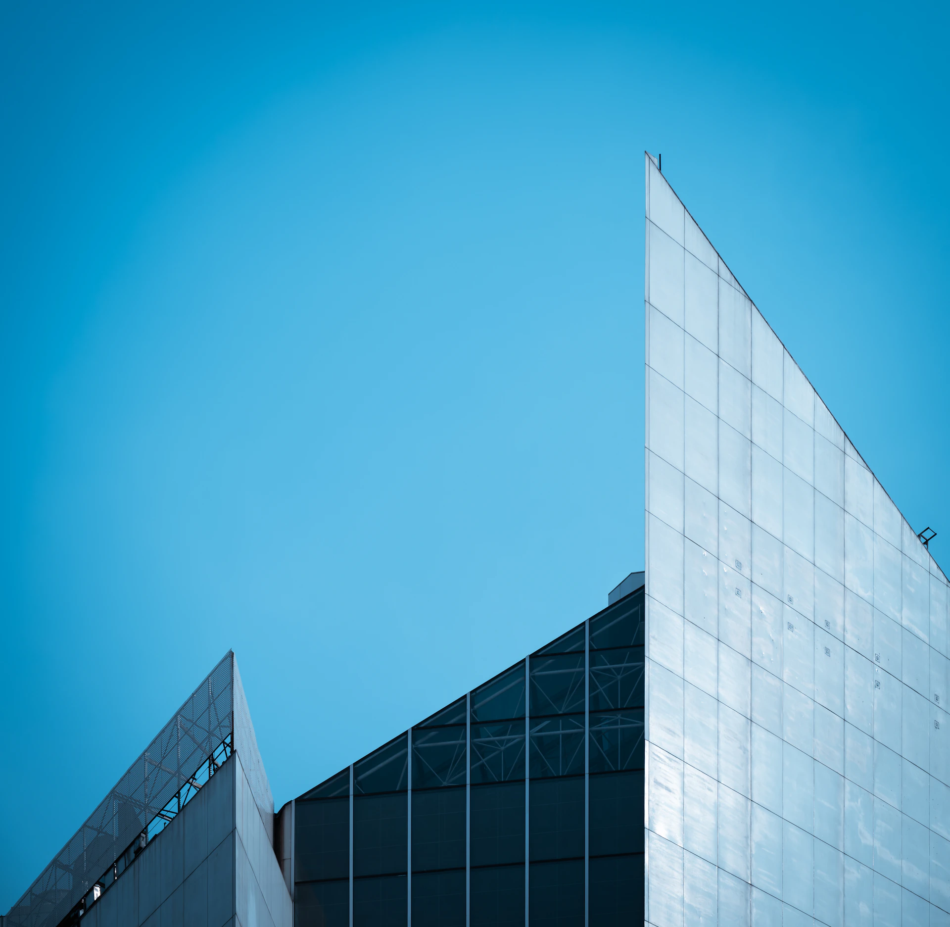 A tall building with a sky background