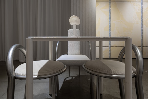 A room with a table and two chairs