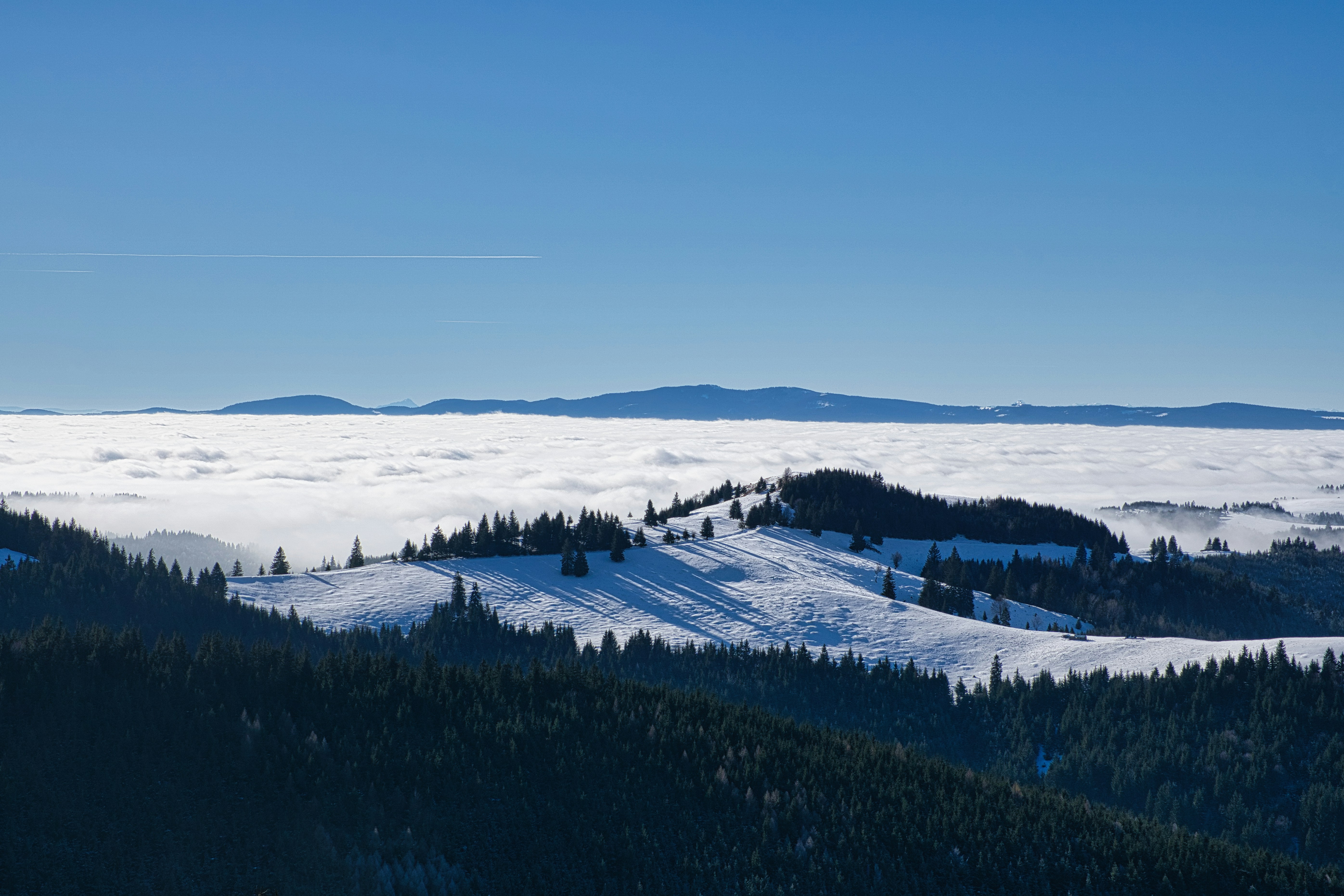 A view of a mountain covered in snow