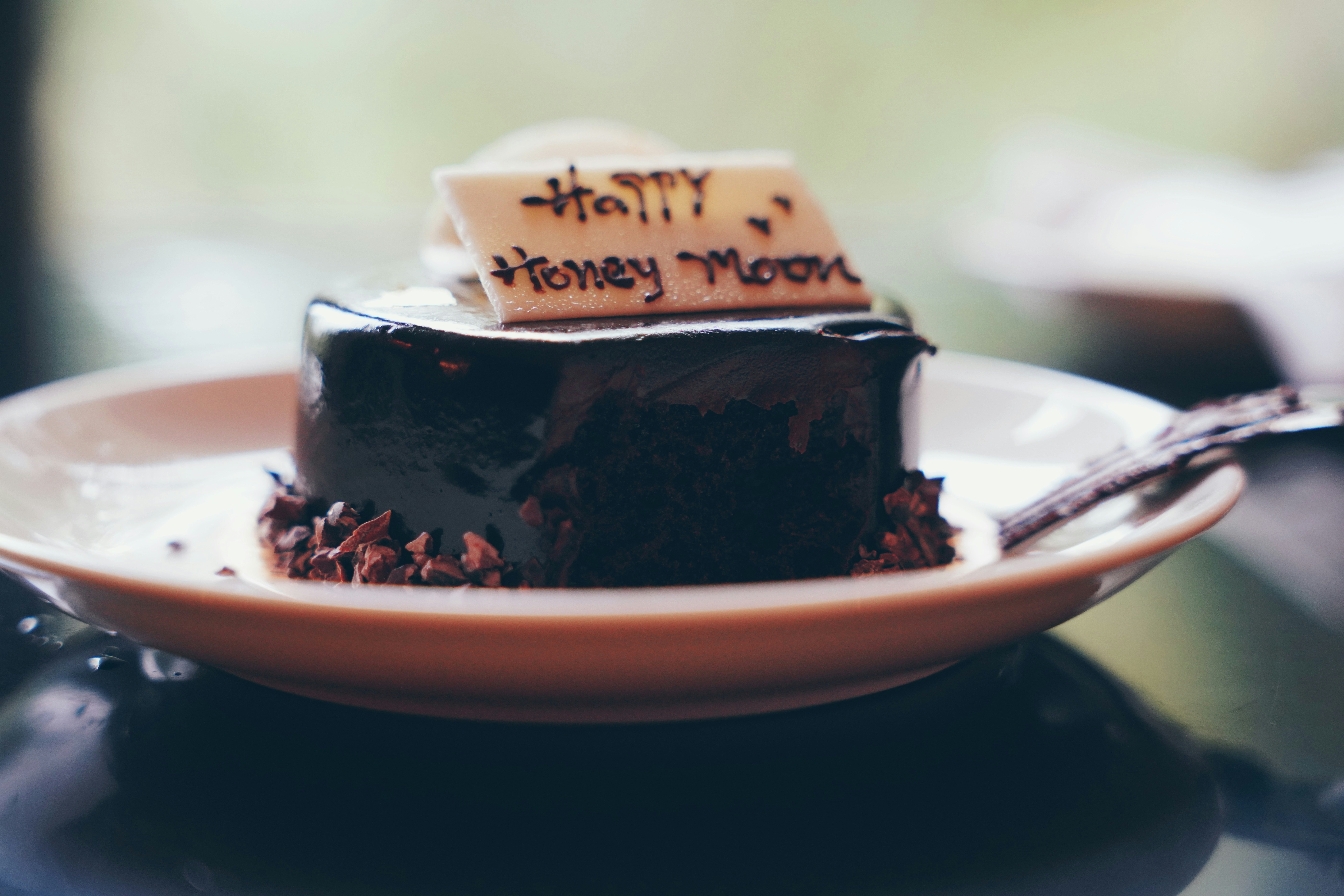 A piece of cake on a plate on a table