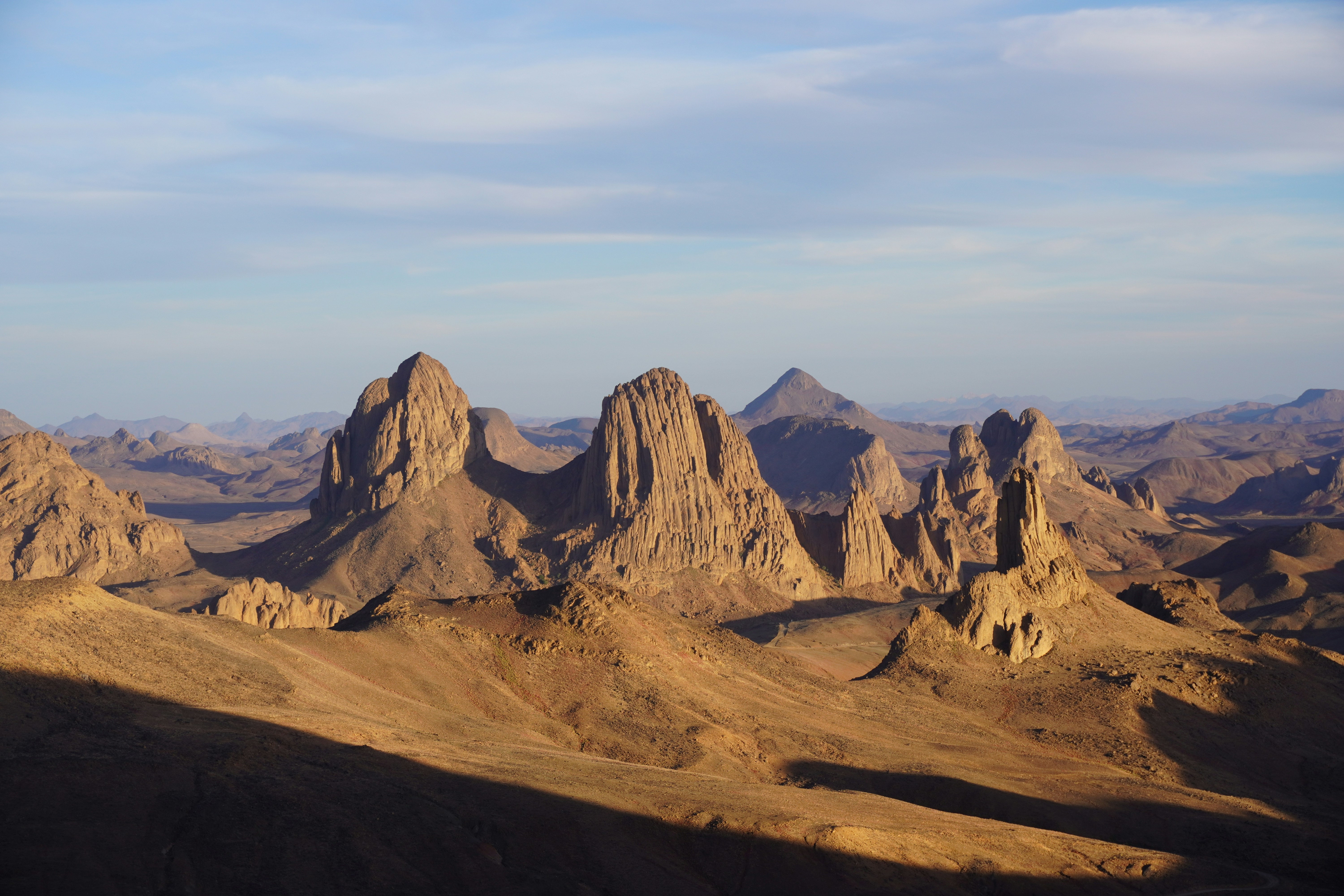 A group of mountains with a sky background