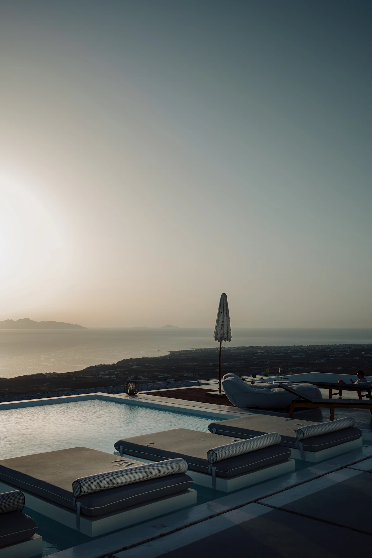 Infinity pool at sunset, luxury resort
