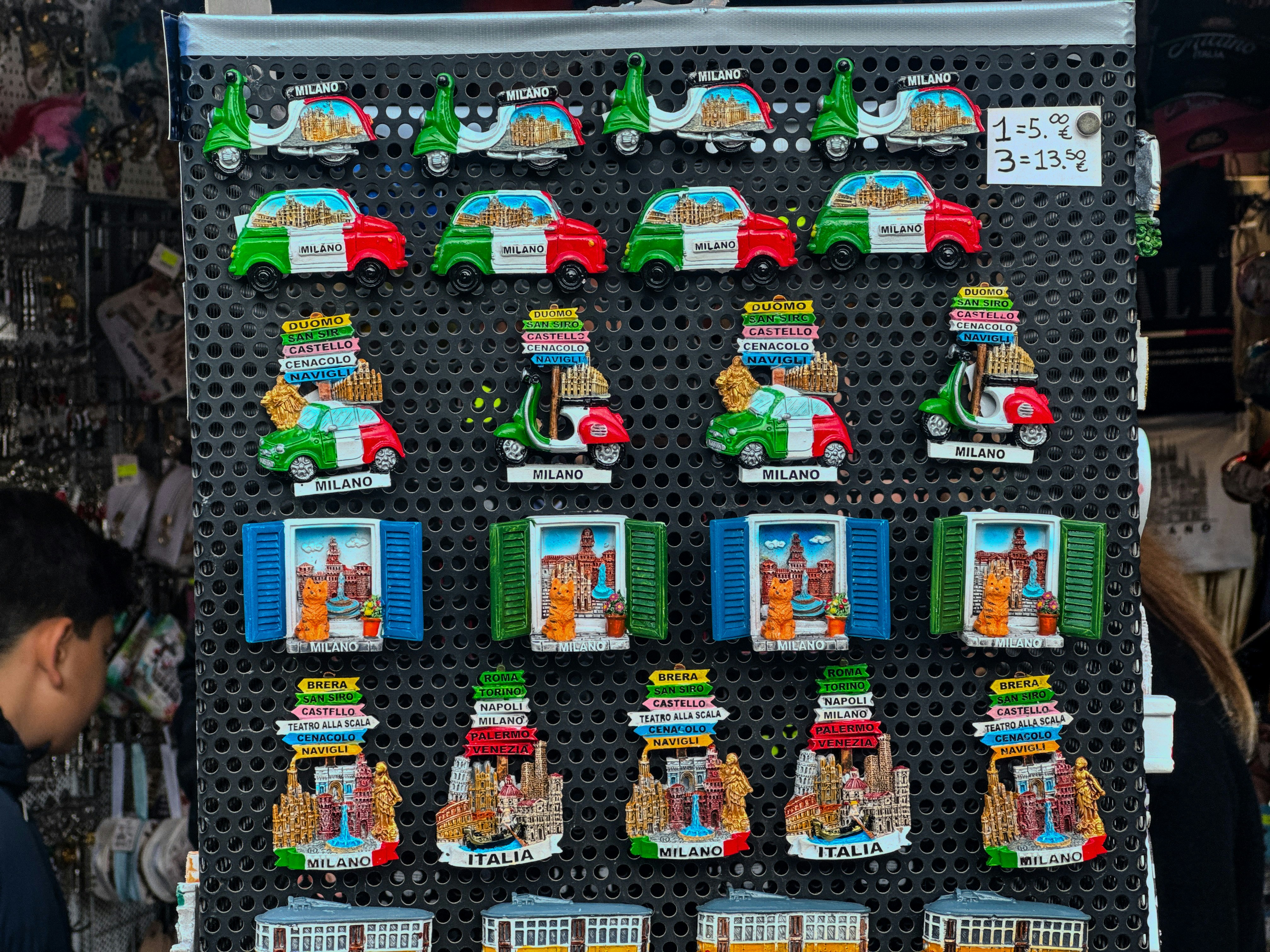 A man standing in front of a display of legos