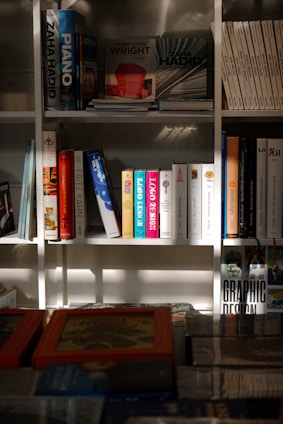 A book shelf filled with lots of books