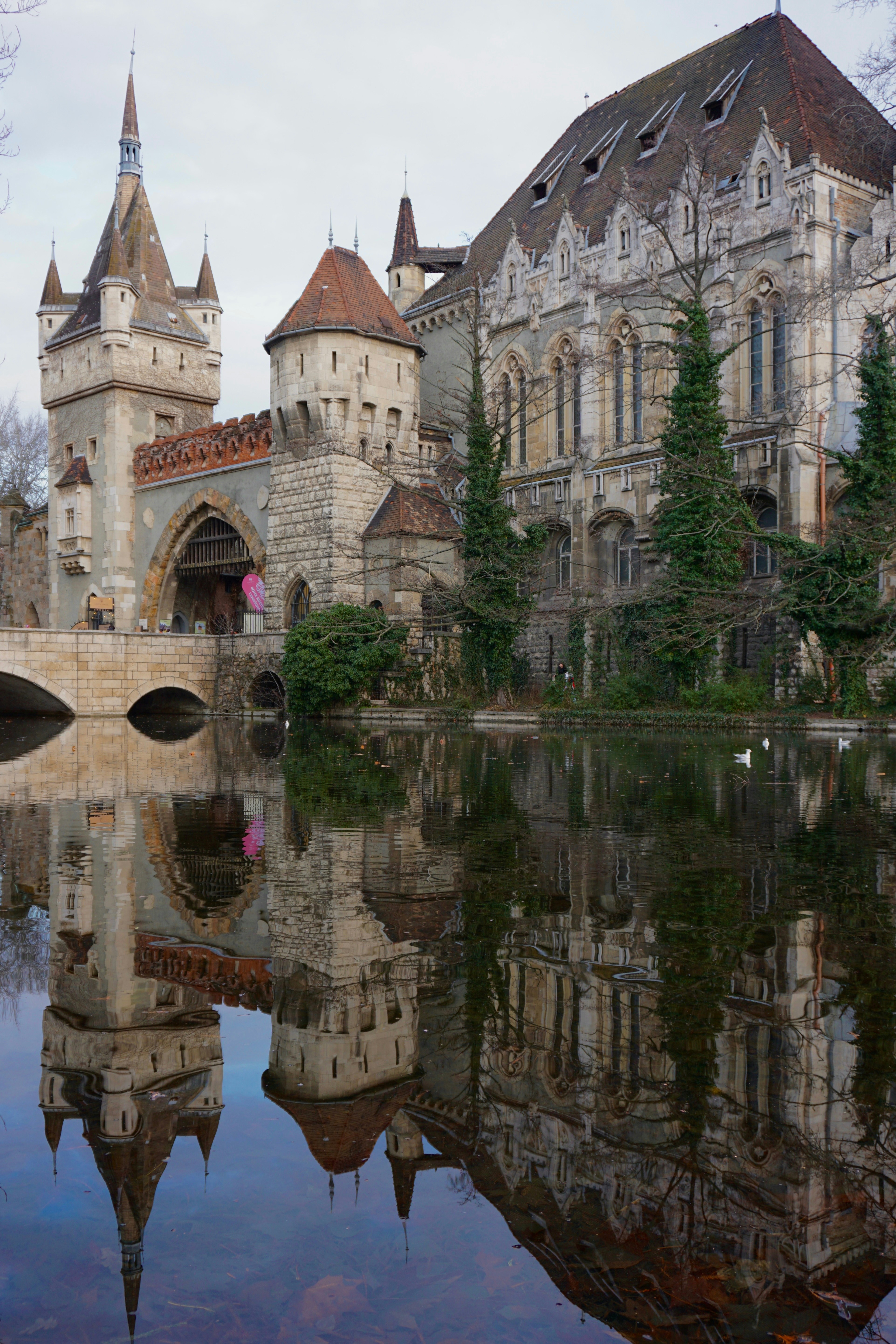 A castle with a bridge over a body of water