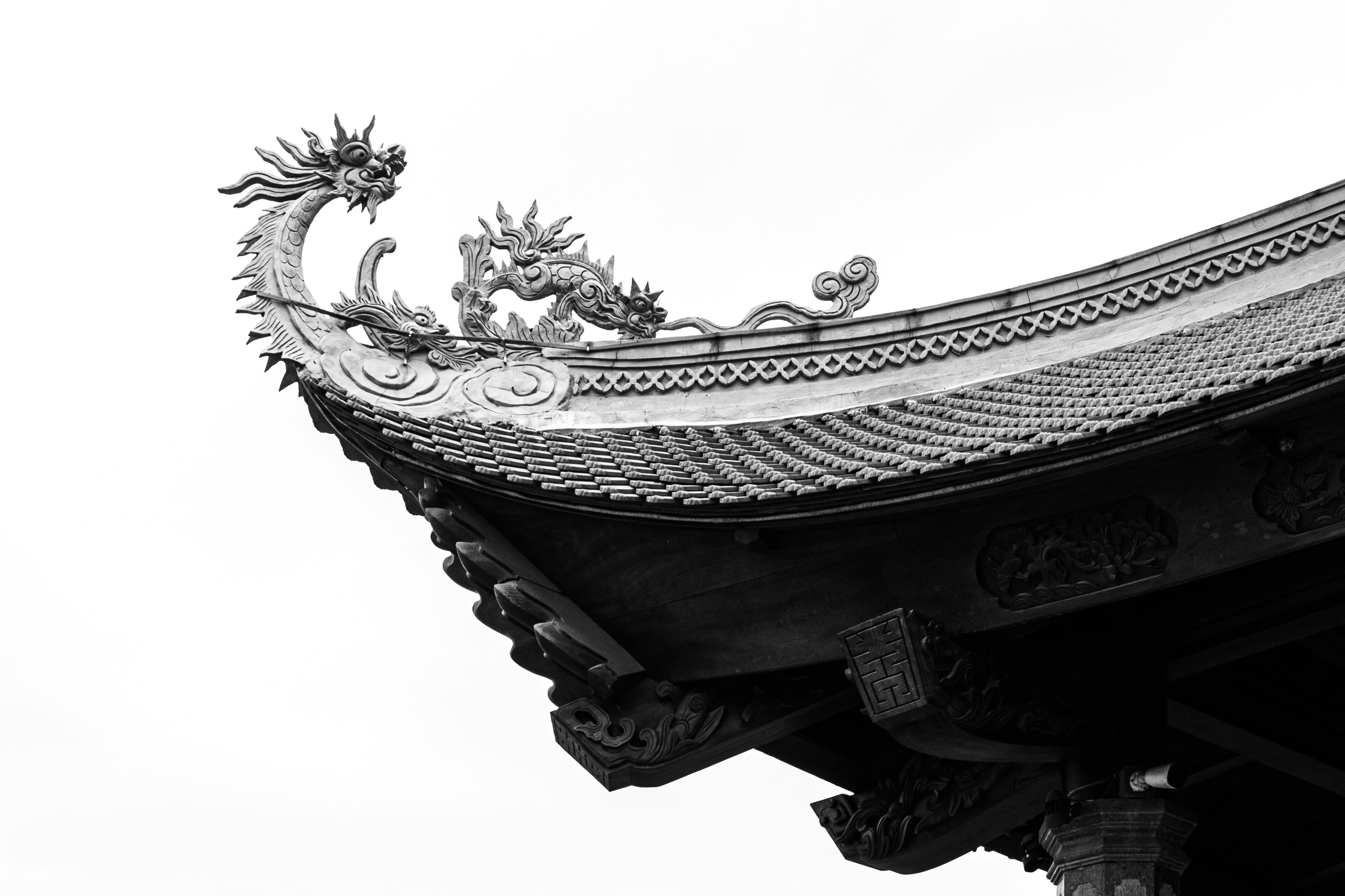 A black and white photo of an oriental building