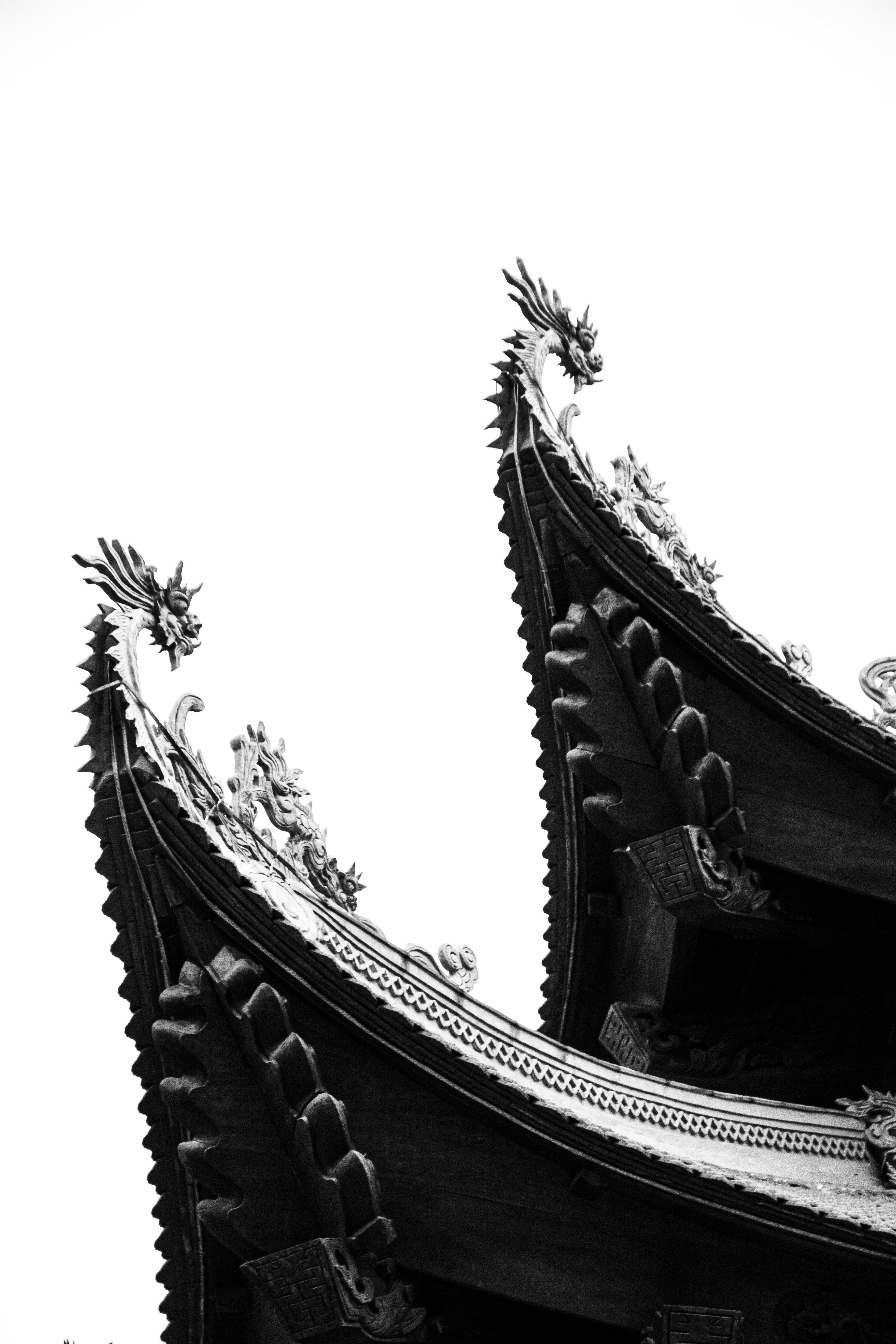 A black and white photo of an oriental building
