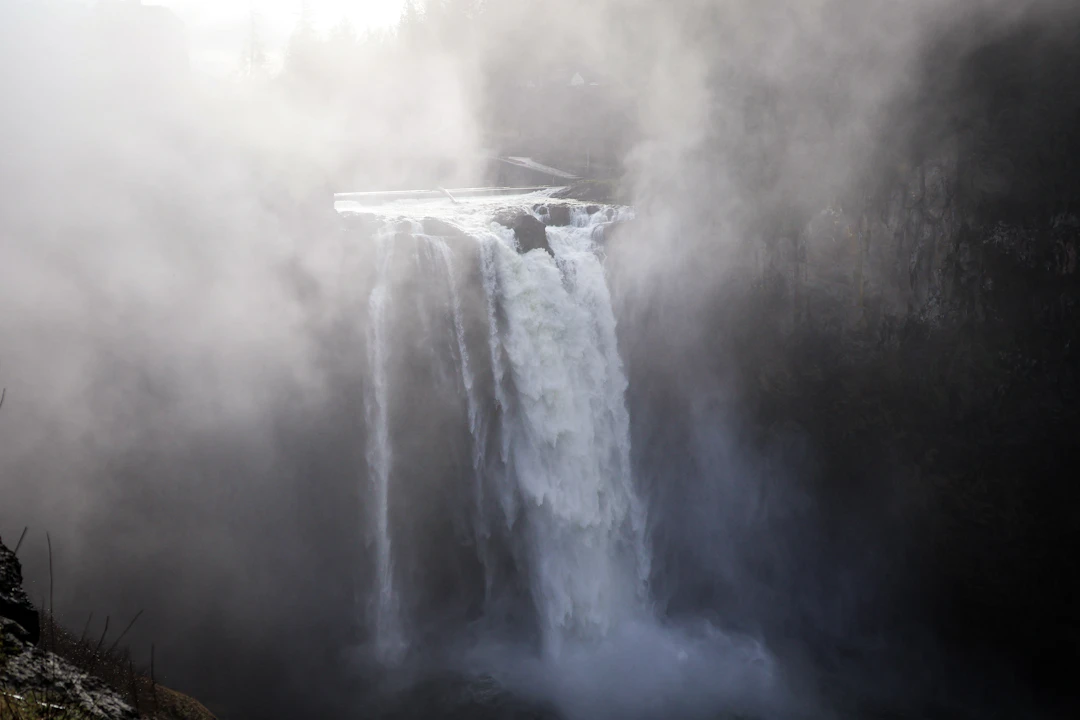 Snoqualmie Falls with mist around the waterfall in Washington