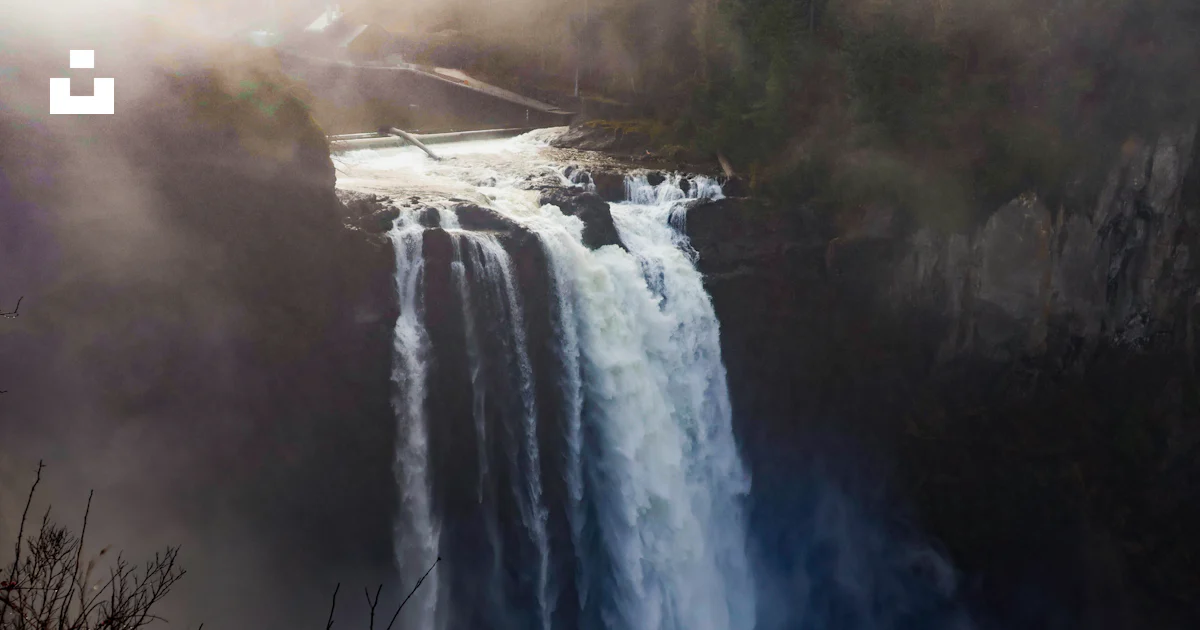 A large waterfall with water pouring out of it photo – Free Snoqualmie ...