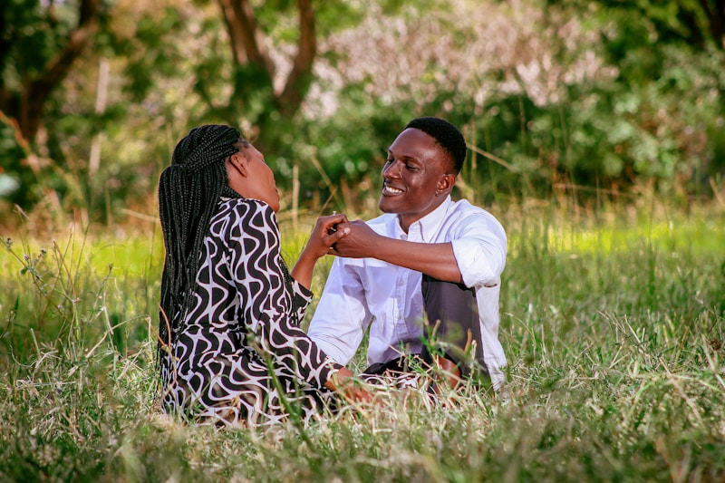 Couple sitting in grass