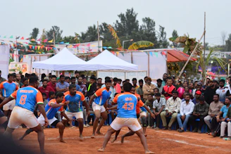 A group of men playing a game of frisbee