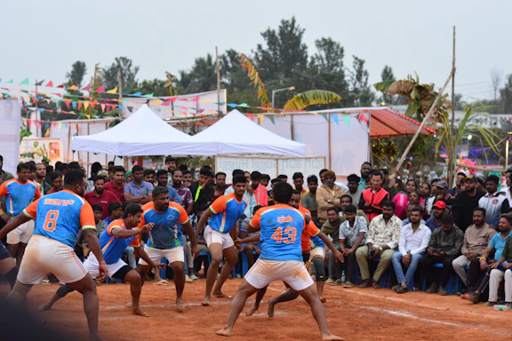 A group of men playing a game of frisbee