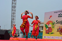 A group of people that are standing on a stage