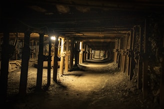 A dark tunnel with a light at the end