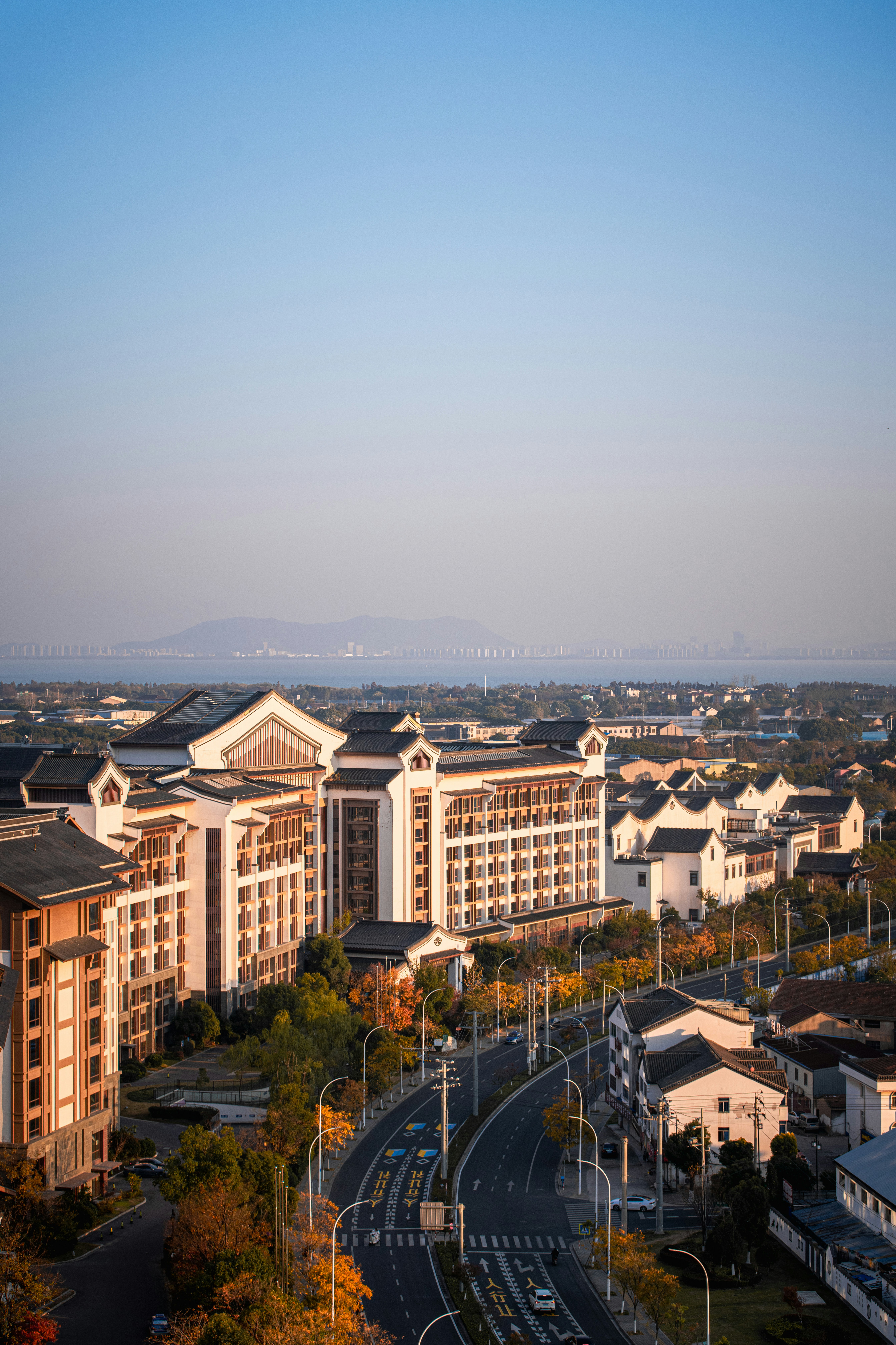 An aerial view of a city with tall buildings