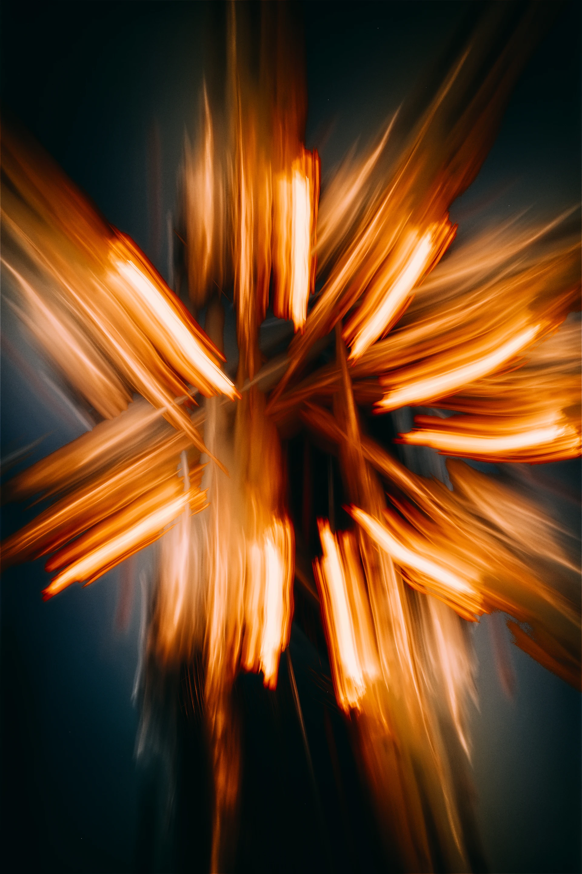A blurry photo of a cross made of wood