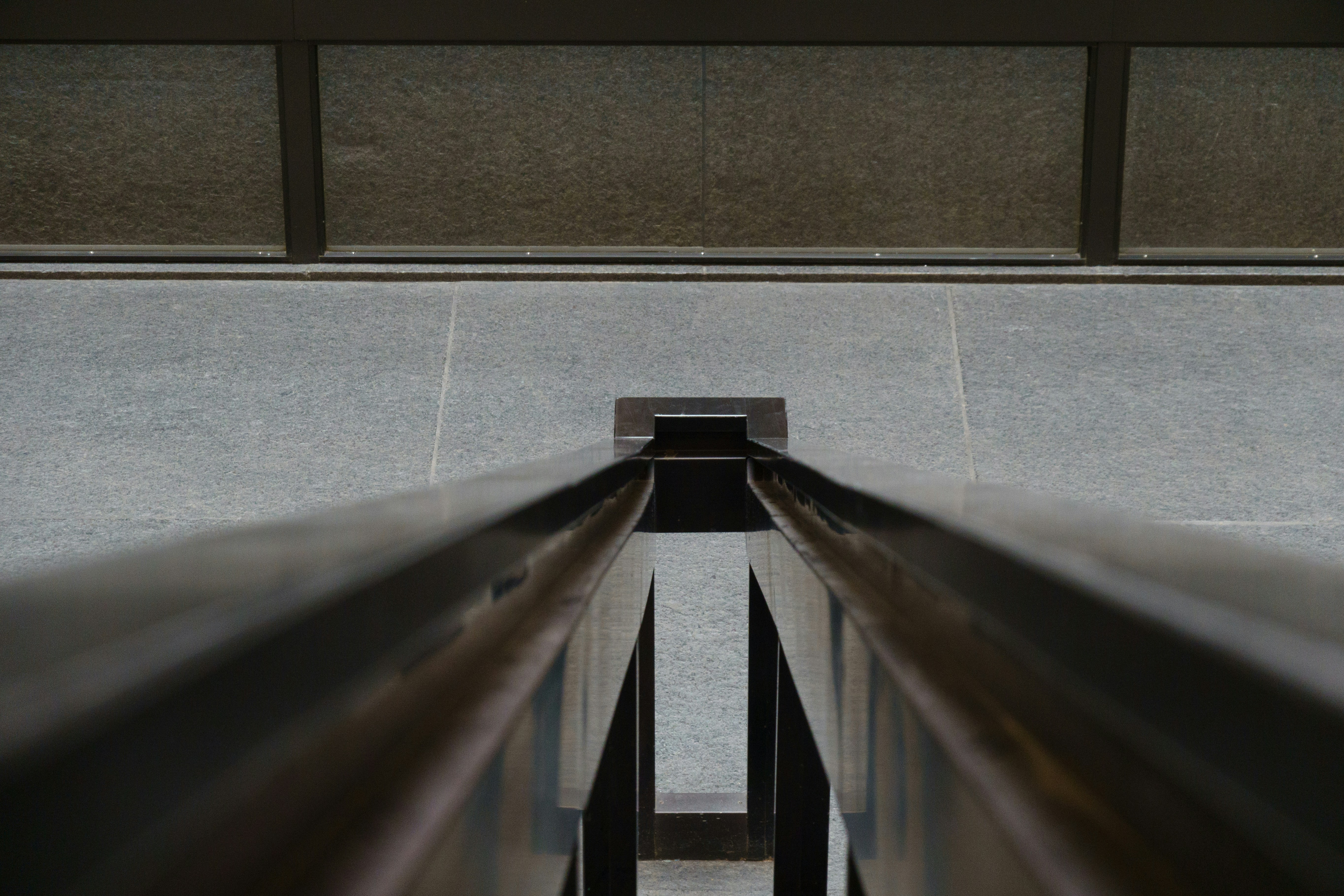 Close-up on a compliant handrail - ada compliant ramp specifications
