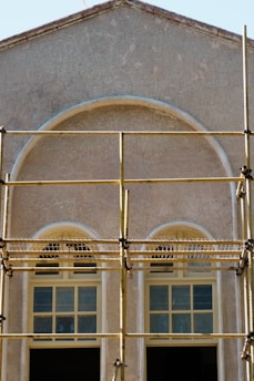 A building with scaffolding on the front of it