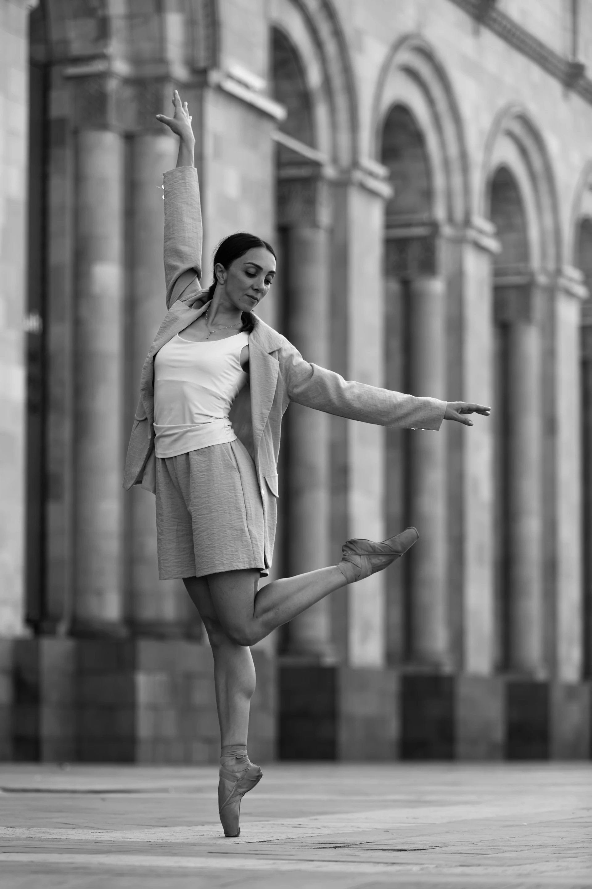 A black and white photo of a ballerina
