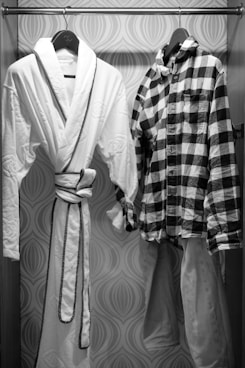 A robe and a robe hanging on a rack