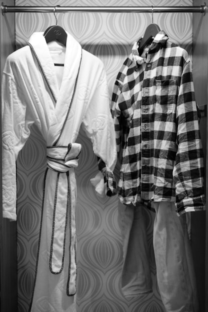 A robe and a robe hanging on a rack