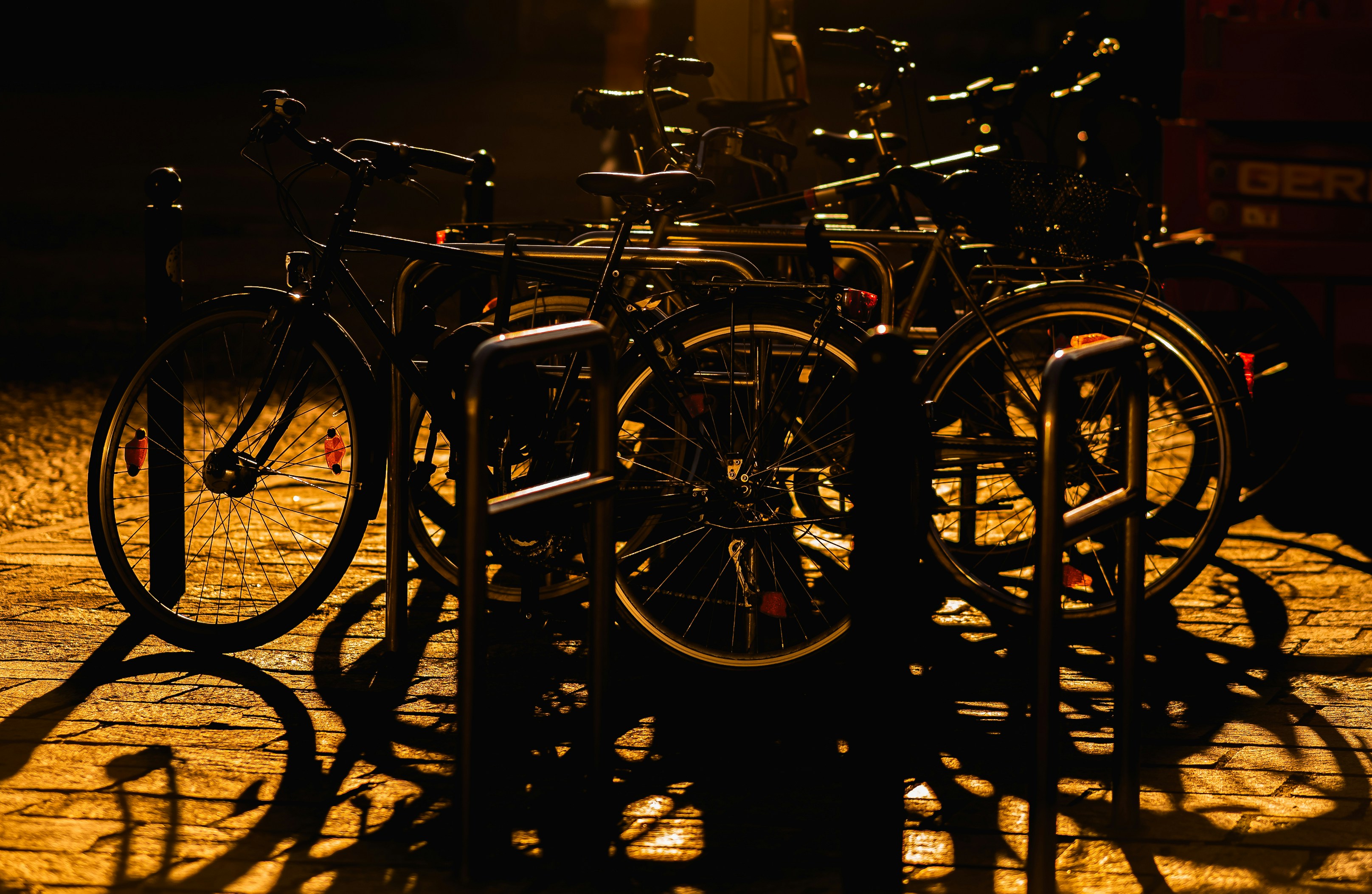A bunch of bikes parked next to each other