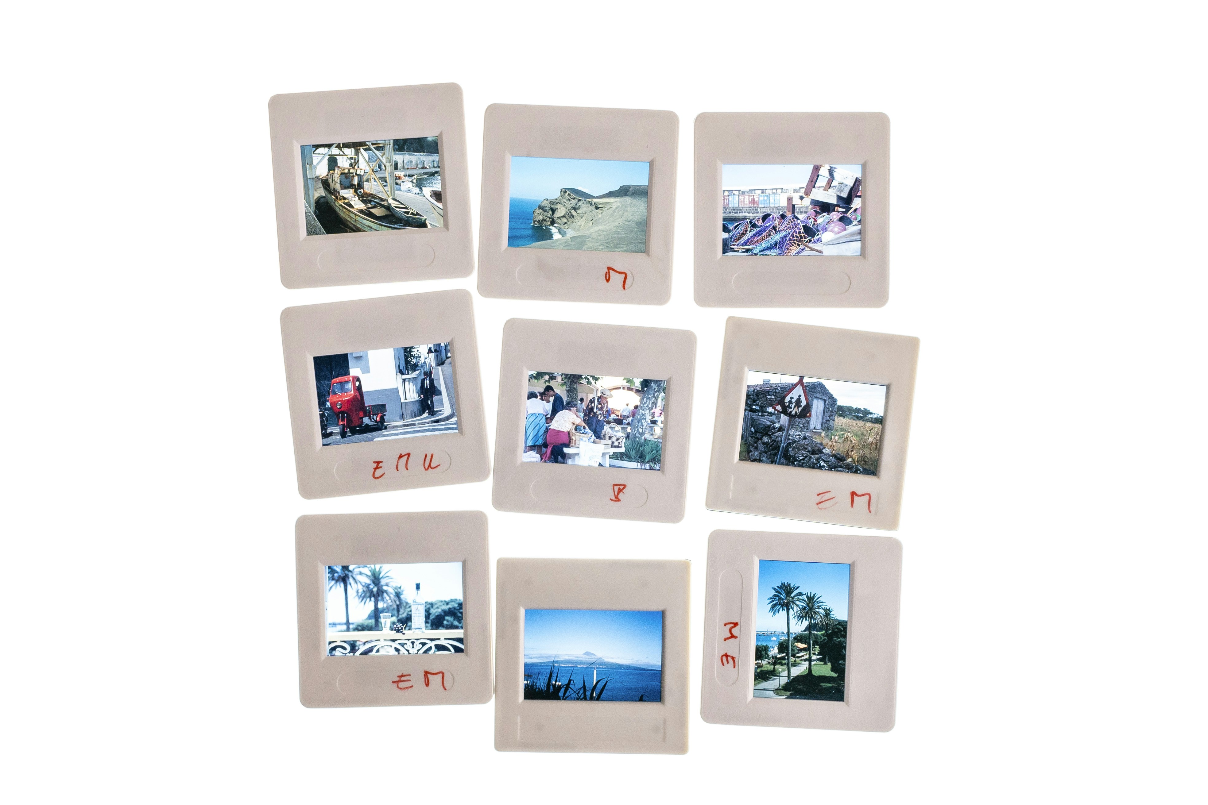 A bunch of pictures hanging on a wall