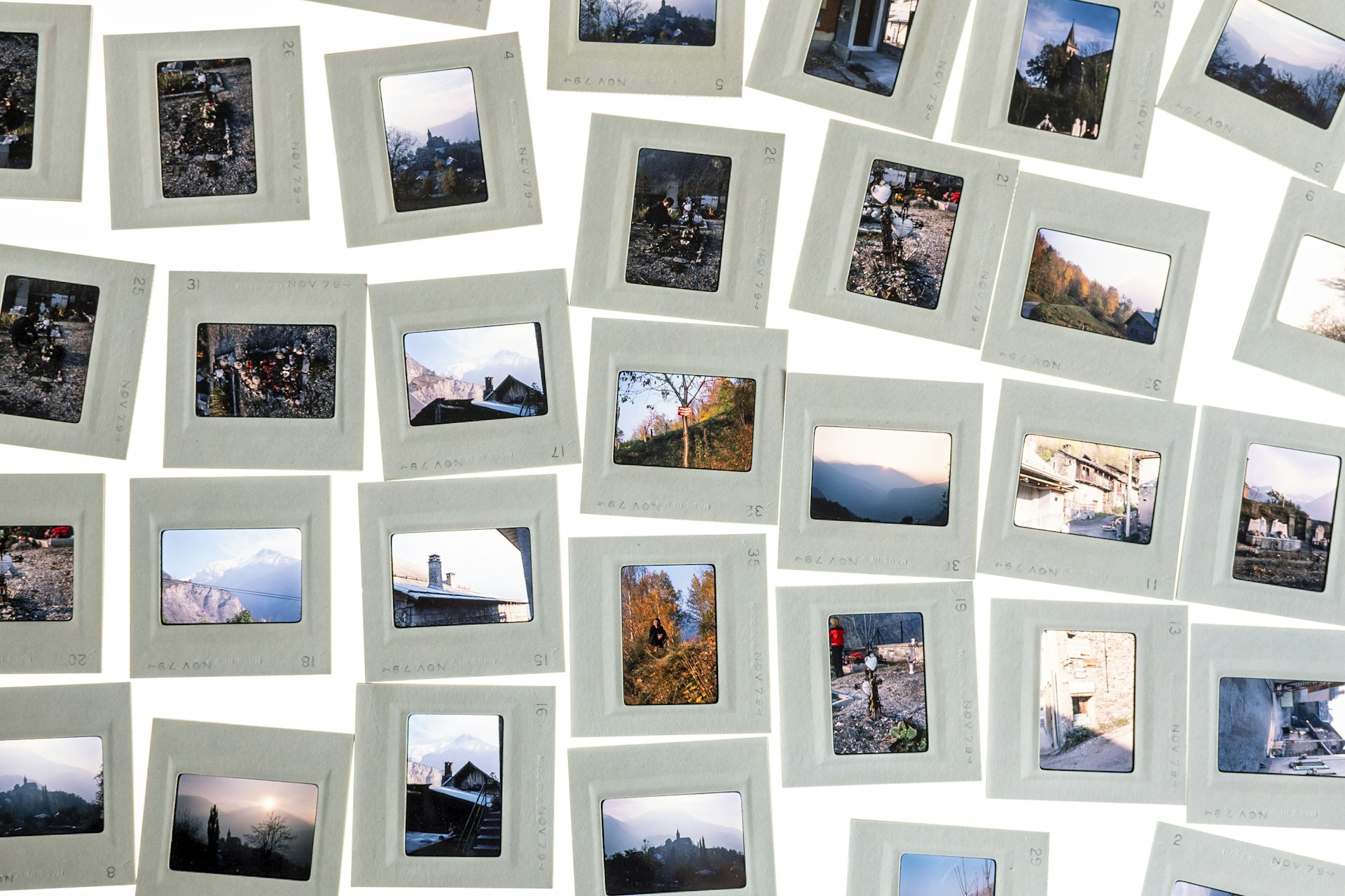 A bunch of pictures hanging on a wall