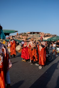 A group of people standing around each other