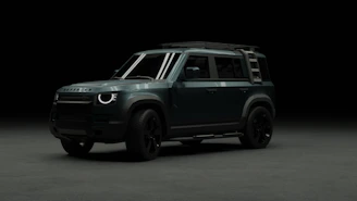 A black and white photo of a car in the dark