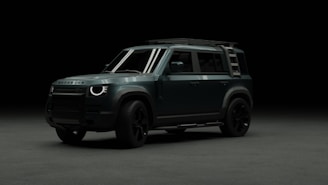 A black and white photo of a car in the dark