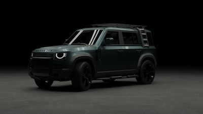 A black and white photo of a car in the dark