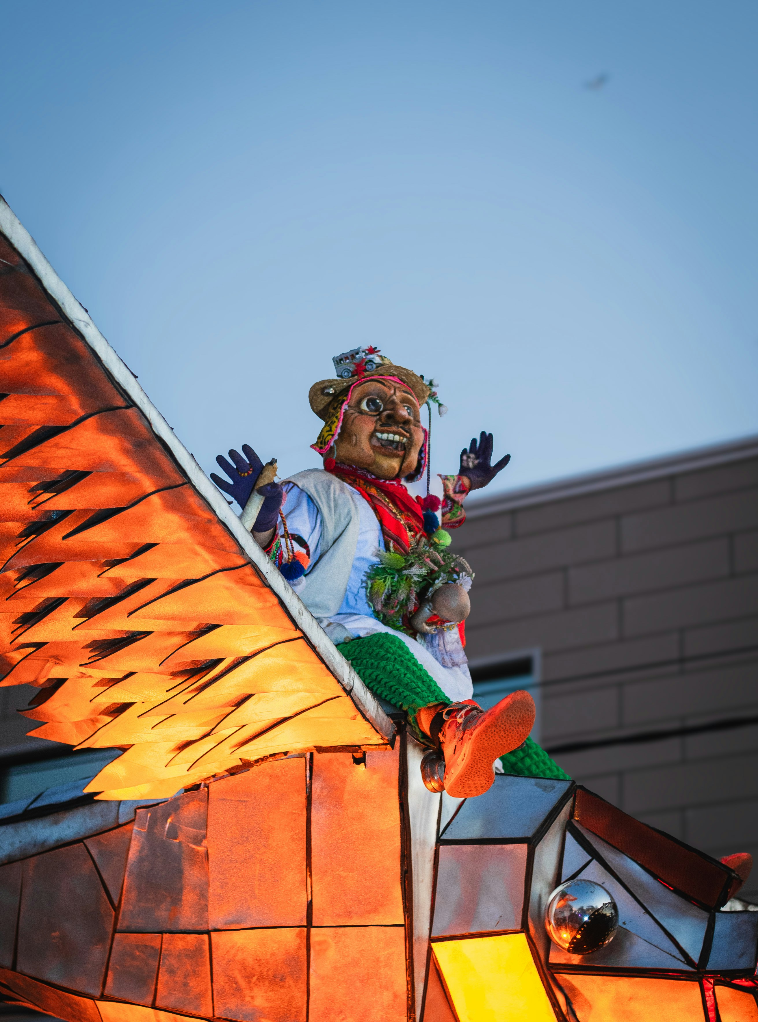 A statue of a man on top of a building