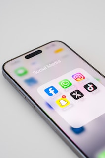 A close up of an iPhone on a white surface