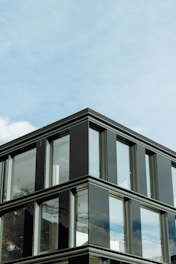 A tall building with lots of windows on top of it