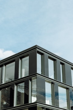 A tall building with lots of windows on top of it