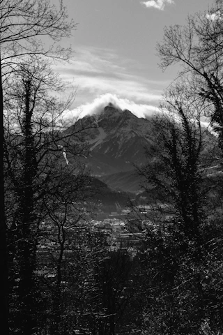 A black and white photo of a mountain