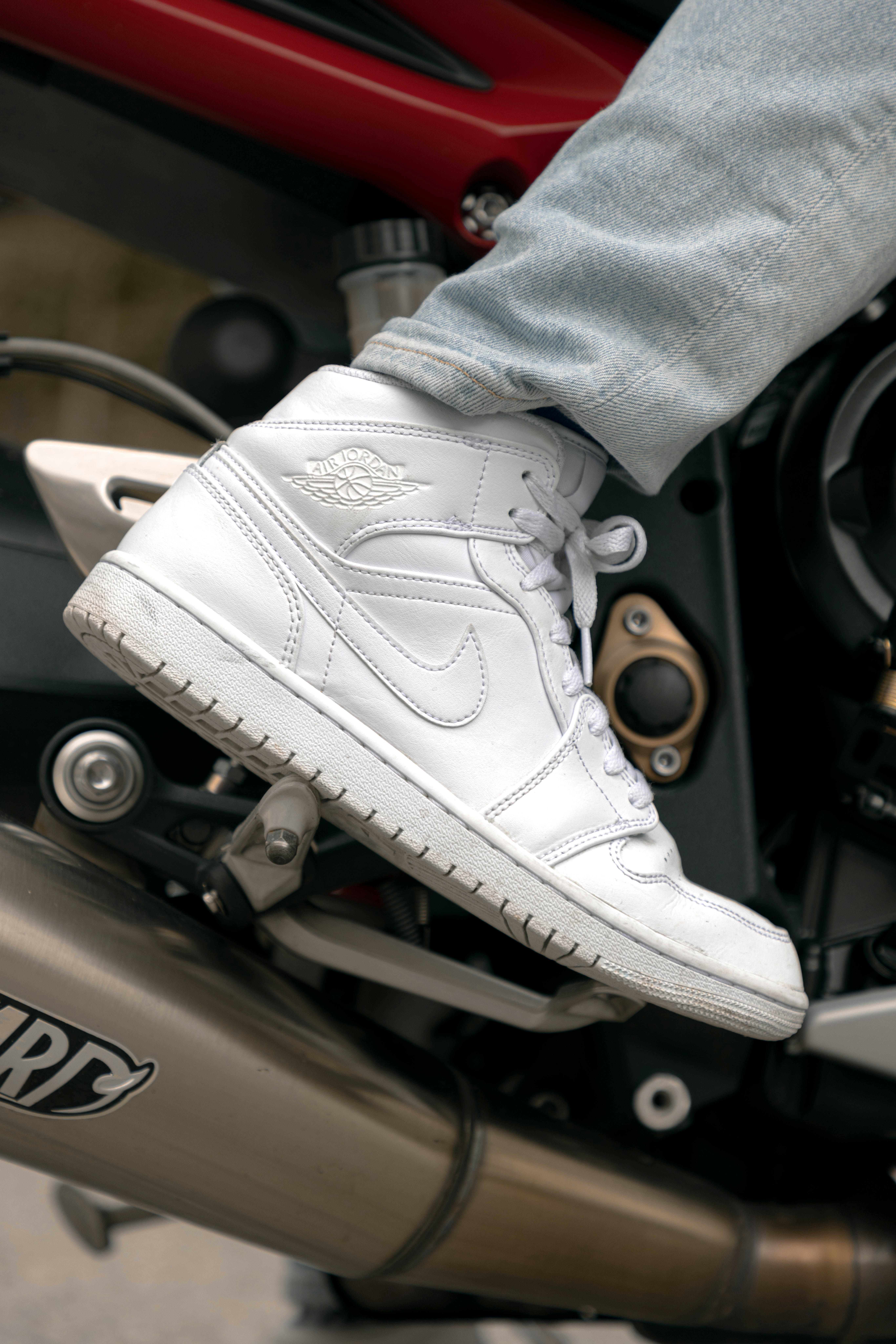 A person riding on the back of a motorcycle