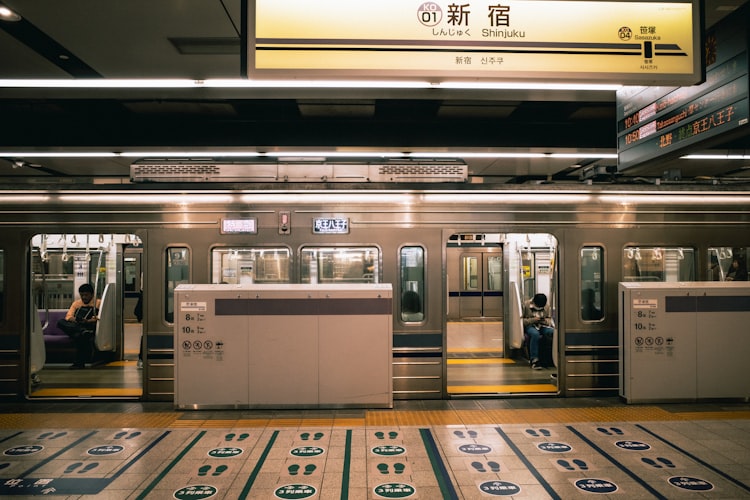 ICOCA and Suica IC cards on a Tokyo station gate — essential tools for anime tourists in Japan